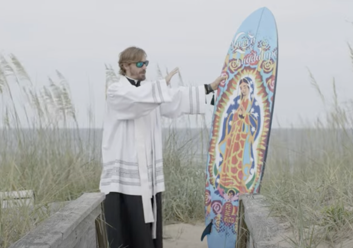 Fr. Dan Molochko Blessing Surfboard